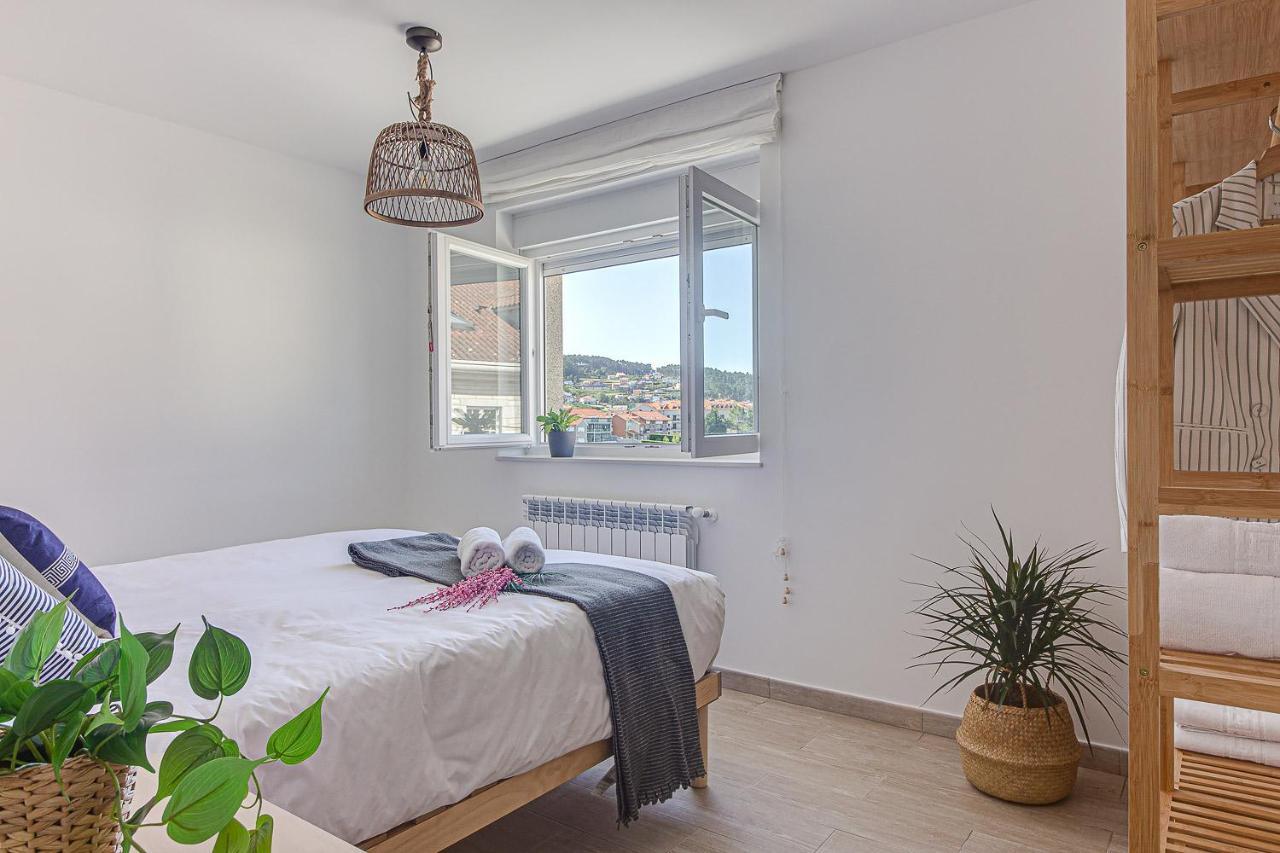 Apartamentos Playa De فينيستيري المظهر الخارجي الصورة
